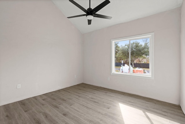 unfurnished room with light hardwood / wood-style flooring, ceiling fan, and lofted ceiling