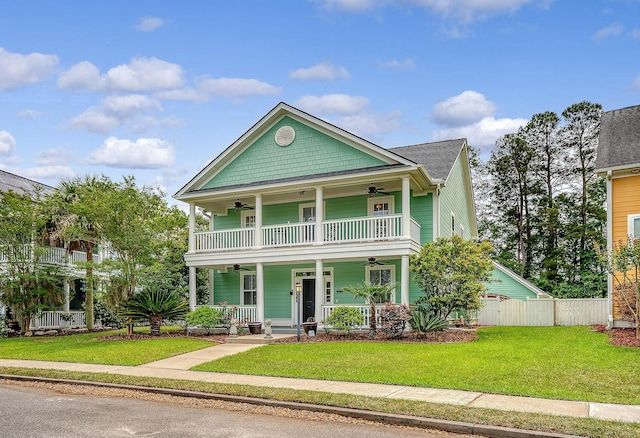 view of front of house with a ceiling fan and covered porch