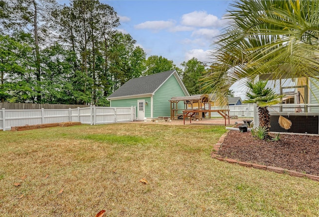 view of yard with a deck