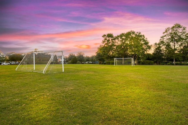 yard at dusk with a sport area
