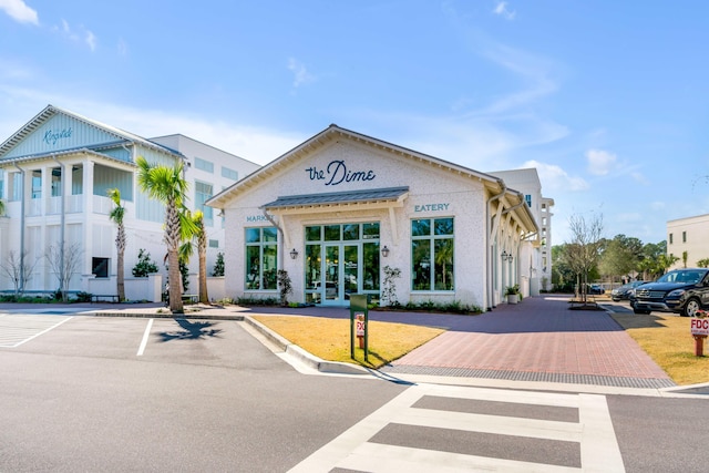 405 Spartina Ln Unit 405, Charleston, SC 29492 - view of building exterior with uncovered parking