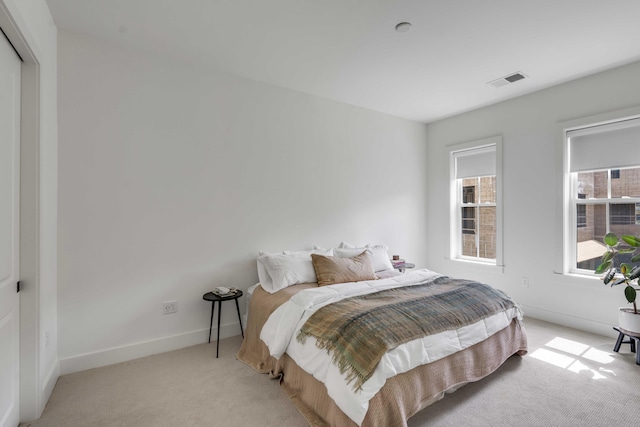 405 Spartina Ln Unit 405, Charleston, SC 29492 - bedroom featuring light carpet and baseboards
