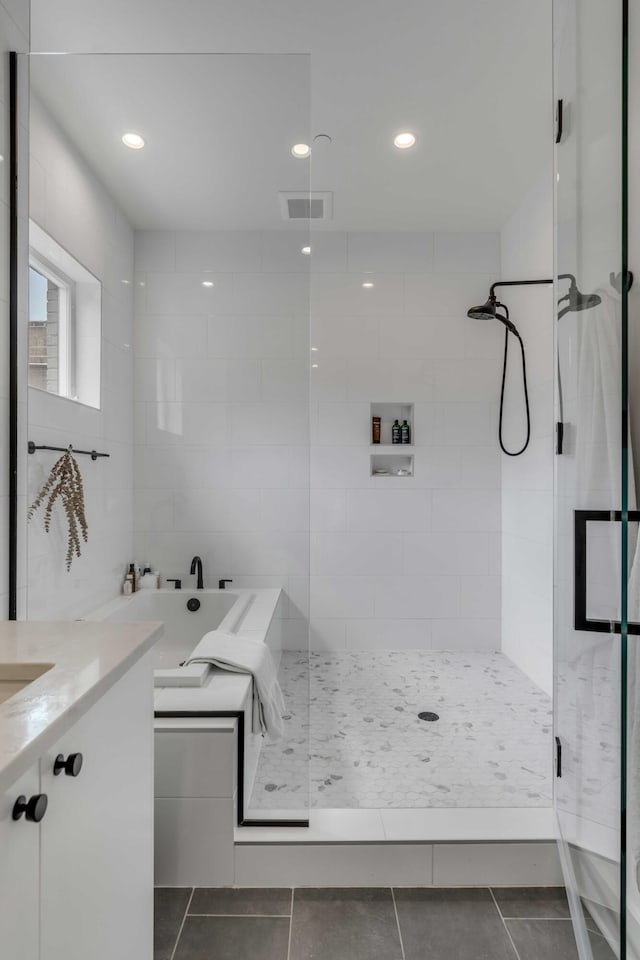 405 Spartina Ln Unit 405, Charleston, SC 29492 - bathroom featuring a stall shower, tile patterned flooring, and recessed lighting