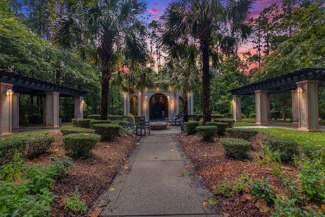 view of home's community featuring a pergola