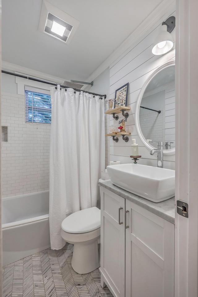 full bathroom featuring ornamental molding, vanity, shower / tub combo with curtain, toilet, and wood walls