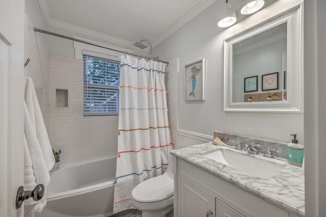 full bathroom featuring vanity, toilet, crown molding, and shower / tub combo with curtain