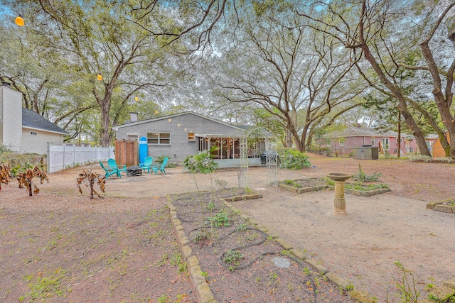 view of yard with a sunroom