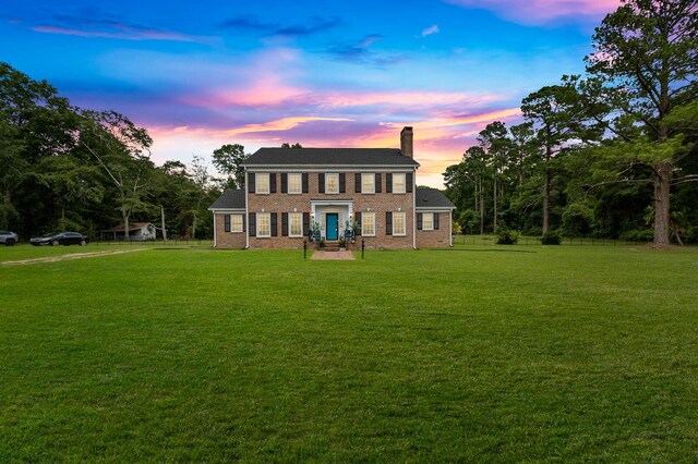 colonial house with a lawn