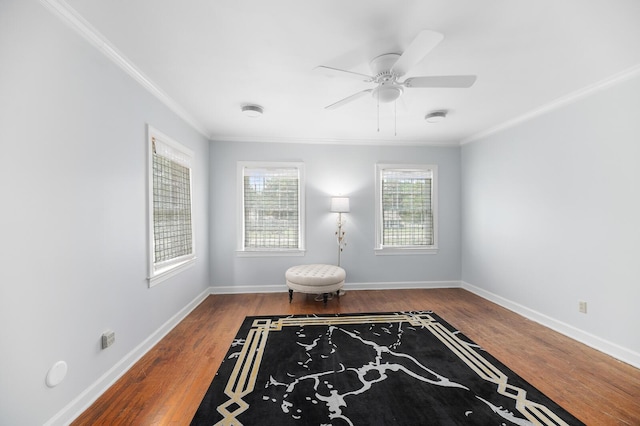 unfurnished room featuring crown molding, hardwood / wood-style flooring, and ceiling fan