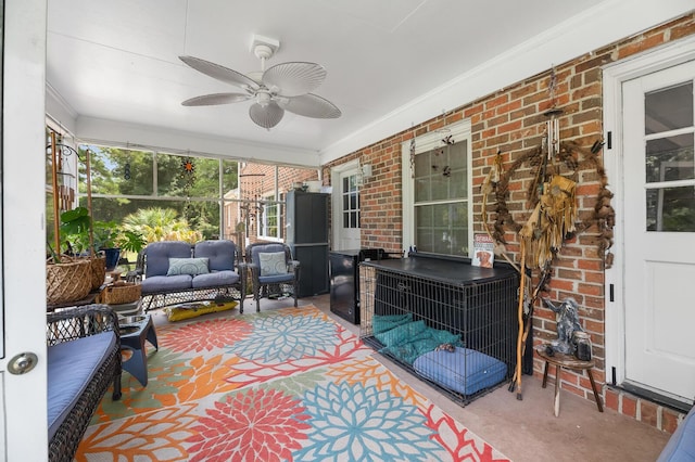 sunroom / solarium with ceiling fan