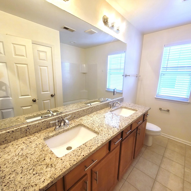 full bath featuring visible vents, a sink, and toilet