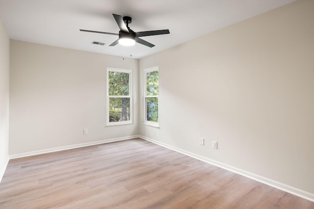 1478 Diamond Blvd, Mount Pleasant, SC 29466 - empty room with light wood-style flooring and a ceiling fan