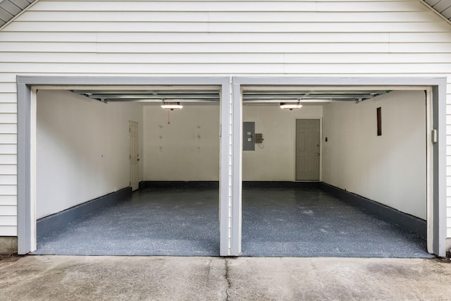 1478 Diamond Blvd, Mount Pleasant, SC 29466 - garage with concrete driveway, electric panel, and a garage door opener