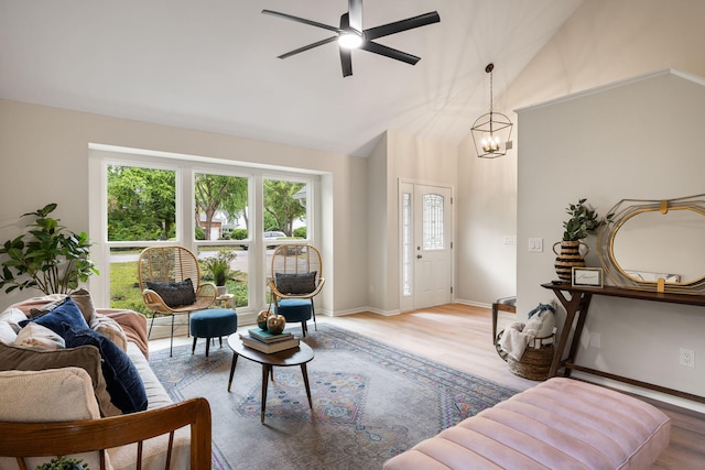 1478 Diamond Blvd, Mount Pleasant, SC 29466 - living area featuring plenty of natural light, ceiling fan, vaulted ceiling, wood finished floors, and a chandelier