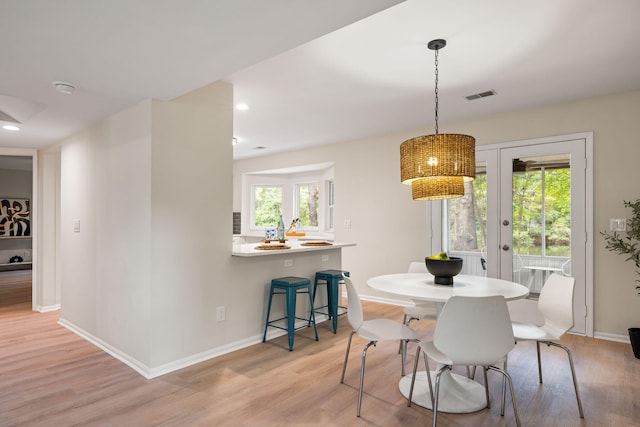 1478 Diamond Blvd, Mount Pleasant, SC 29466 - dining area with french doors, light wood-style flooring, and recessed lighting