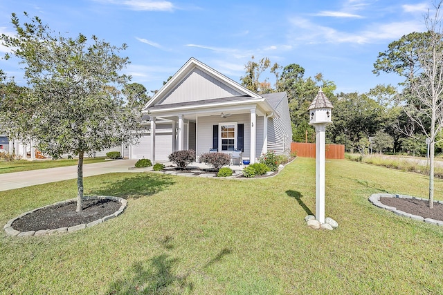 view of front of home featuring a front lawn and a garage