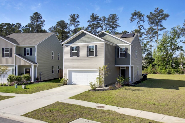 view of front facade featuring a garage and a front lawn