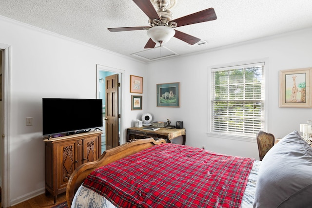 1067 Loyalist Ln, Mount Pleasant, SC 29464 - bedroom featuring a textured ceiling, crown molding, attic access, and ceiling fan