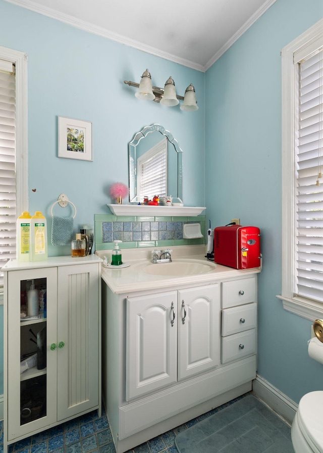 1067 Loyalist Ln, Mount Pleasant, SC 29464 - bathroom with vanity and crown molding