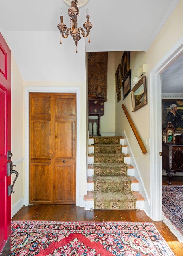 1067 Loyalist Ln, Mount Pleasant, SC 29464 - entrance foyer featuring hardwood / wood-style floors, stairway, and a chandelier