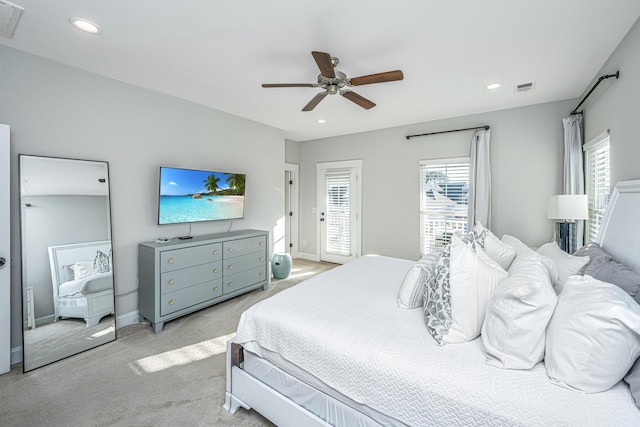 carpeted bedroom featuring ceiling fan