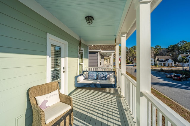 balcony featuring a porch