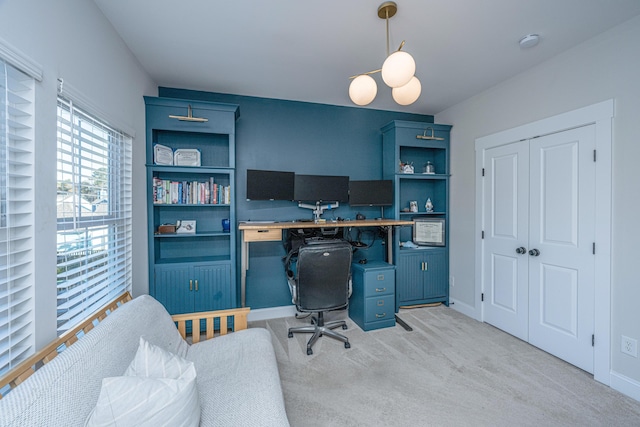 office area with light colored carpet