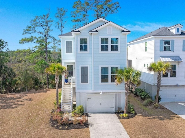 840 Forrest Dr, Charleston, SC 29492 - coastal home with a garage, driveway, and stairway