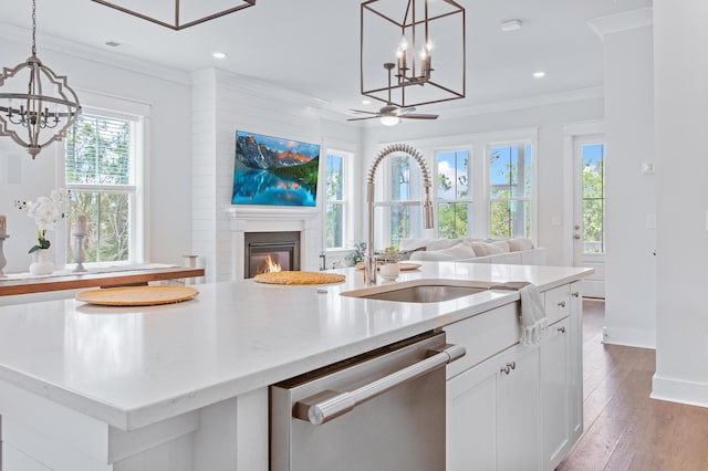 840 Forrest Dr, Charleston, SC 29492 - kitchen with a chandelier, dishwasher, open floor plan, a sink, and crown molding