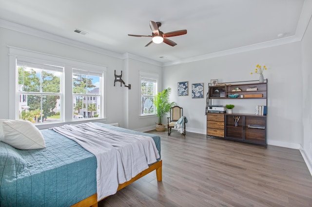 840 Forrest Dr, Charleston, SC 29492 - bedroom with wood finished floors, crown molding, baseboards, and ceiling fan
