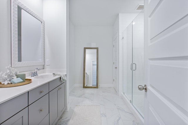 840 Forrest Dr, Charleston, SC 29492 - bathroom featuring marble finish floors, a stall shower, vanity, and baseboards