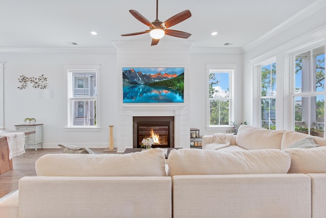 840 Forrest Dr, Charleston, SC 29492 - living room with ornamental molding, a large fireplace, wood finished floors, ceiling fan, and recessed lighting