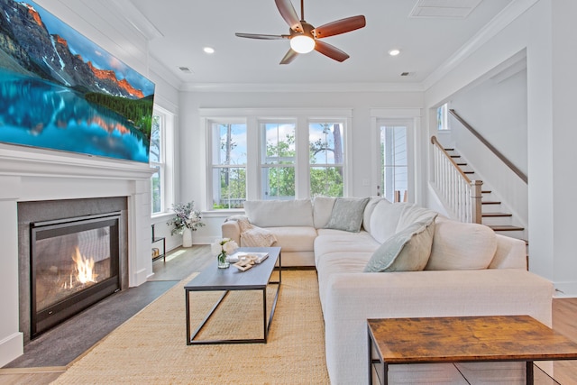 840 Forrest Dr, Charleston, SC 29492 - living room with crown molding, stairs, a ceiling fan, recessed lighting, and a large fireplace