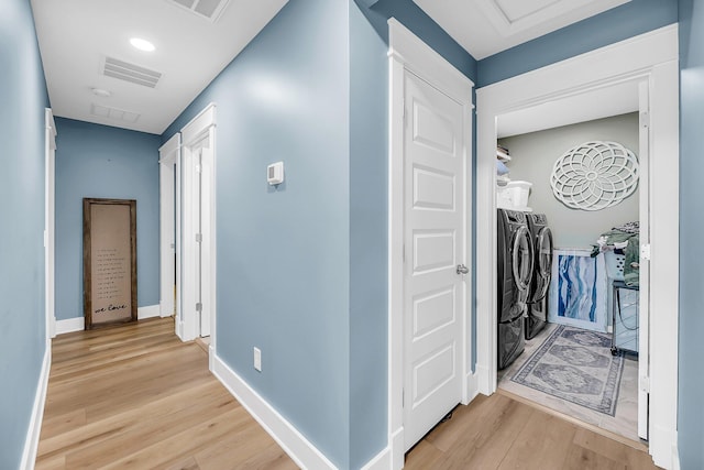 331 Saddlewood Dr, Charleston, SC 29414 - hall with separate washer and dryer and light wood-style floors