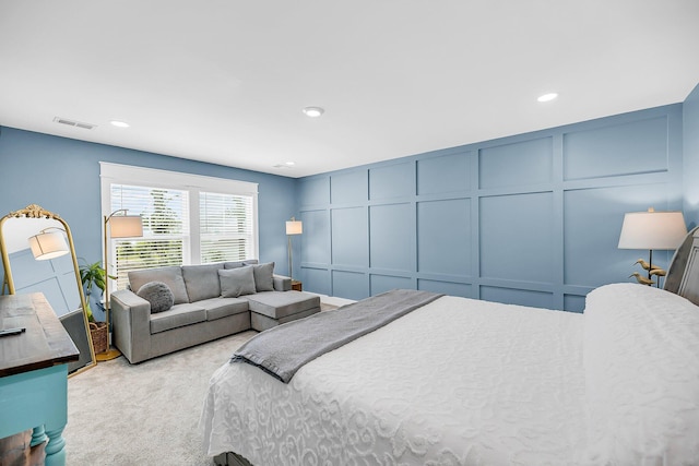 331 Saddlewood Dr, Charleston, SC 29414 - bedroom with a decorative wall, light carpet, and recessed lighting