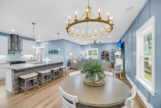 331 Saddlewood Dr, Charleston, SC 29414 - dining room featuring light wood-style floors, a chandelier, ceiling fan, and recessed lighting