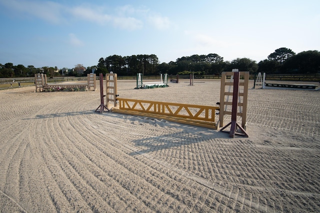 view of community with fence