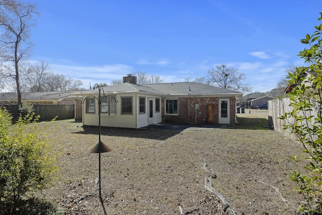 back of house with a patio area