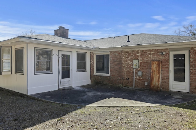 rear view of house featuring a patio area