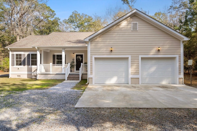 ranch-style home with driveway, crawl space, a garage, and a porch