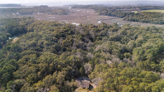 drone / aerial view with a view of trees