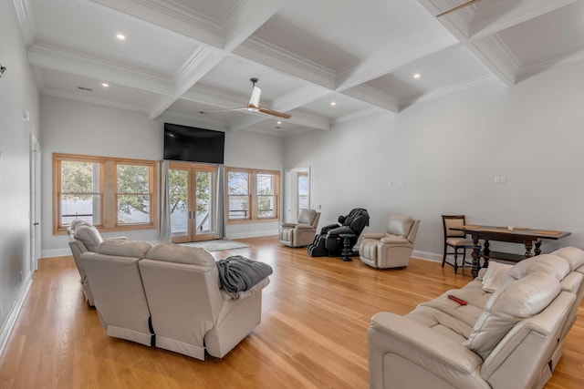 living room featuring ceiling fan, beam ceiling, french doors, and light hardwood / wood-style flooring