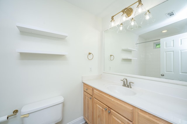 full bath with toilet, visible vents, a shower, and vanity