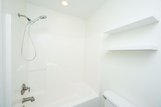 full bath featuring recessed lighting, shower / bathing tub combination, and toilet