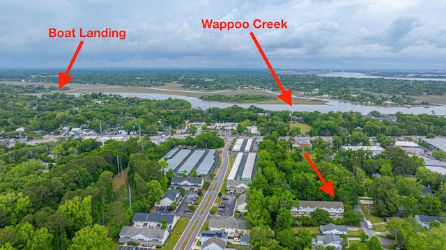 birds eye view of property featuring a residential view and a water view