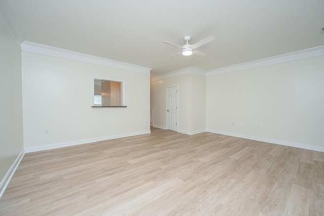 unfurnished room featuring baseboards, ornamental molding, light wood finished floors, and ceiling fan