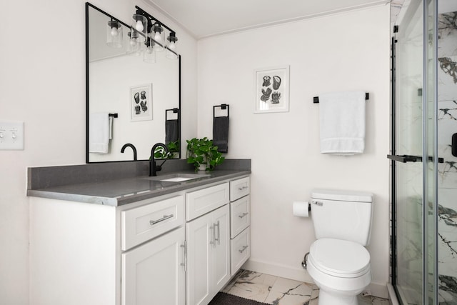 bathroom featuring marble finish floors, baseboards, a marble finish shower, toilet, and vanity