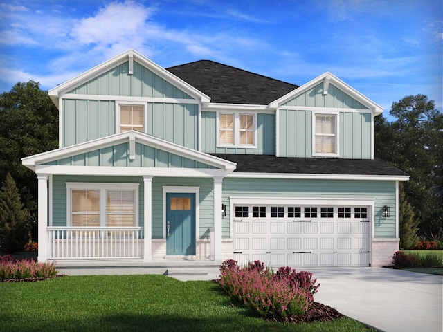 view of front facade with a garage, covered porch, and a front lawn