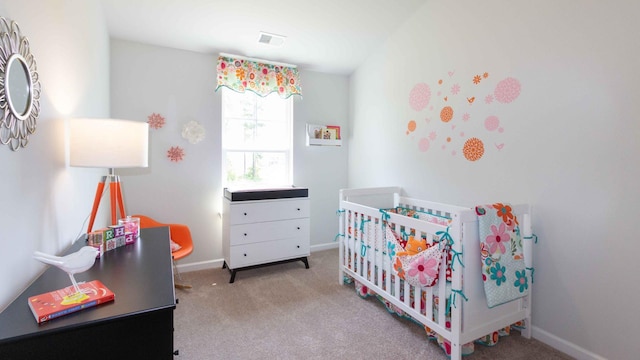 136 Yarrow Way, Moncks Corner, SC 29461 - bedroom featuring carpet floors, baseboards, and a nursery area