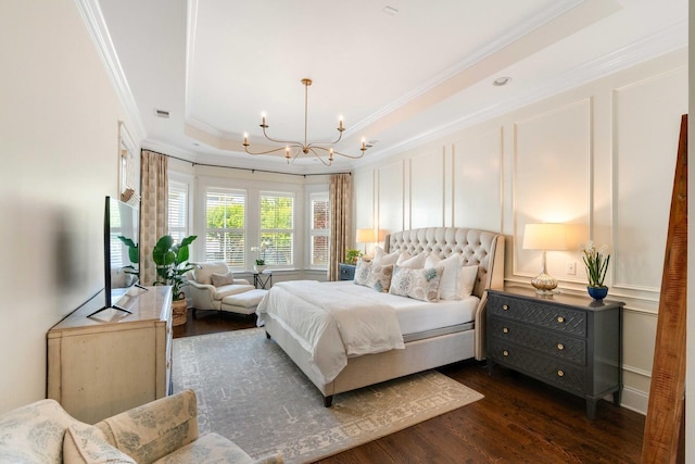 1527 Wando View St, Charleston, SC 29492 - bedroom with a decorative wall, crown molding, a chandelier, dark wood-style flooring, and a tray ceiling